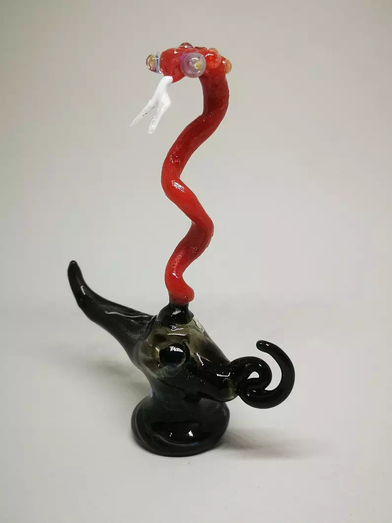 figurine genius snake