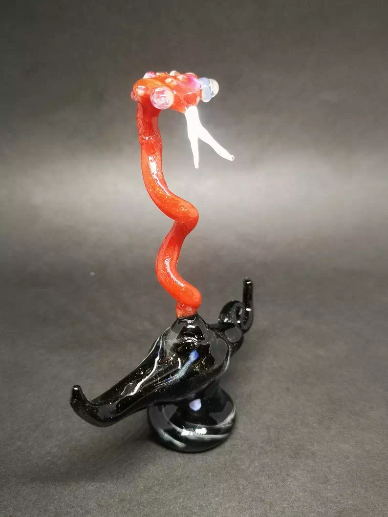 figurine genius snake